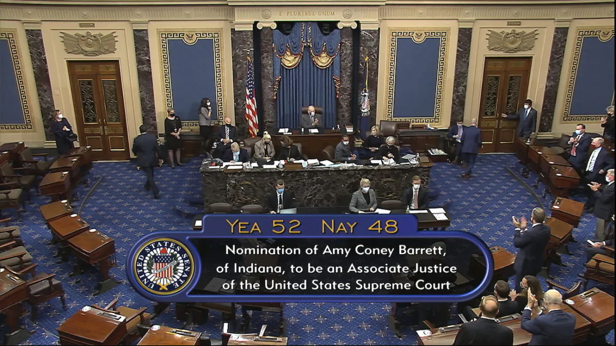 In this image from video, the vote total in the U.S. Senate on the confirmation of Amy Coney Barrett to become a Supreme Court justice at the U.S. Capitol in Washington, on Oct. 26, 2020. (Senate Television via AP)