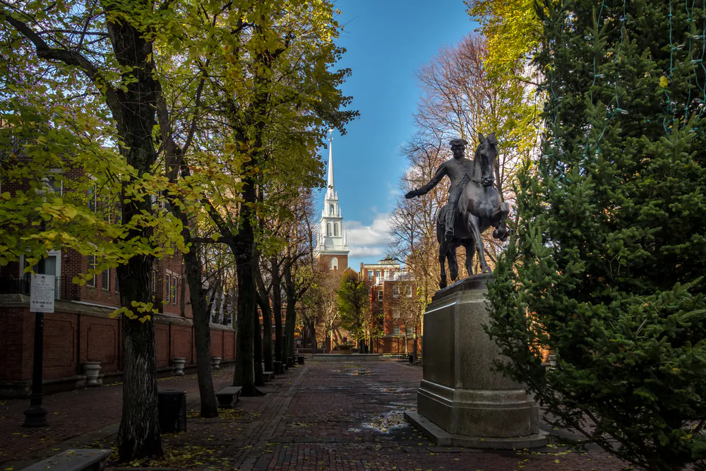 A statue of Paul Revere stands in front of Old North Church. (Diego Grandi/Shutterstock)