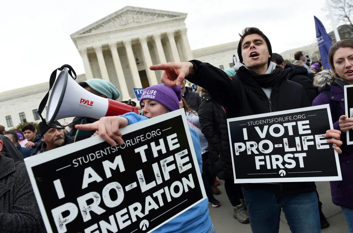Pro-life activists demonstrate in front of the U.S. Supreme Court during the 47th annual March for Life in Washington on Jan. 24, 2020. (Olivier Douliery/AFP via Getty Images)