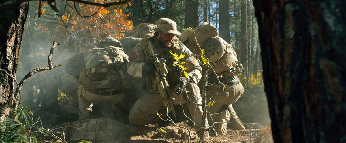 four Navy SEALS in a firefight in "Lone Survivor"