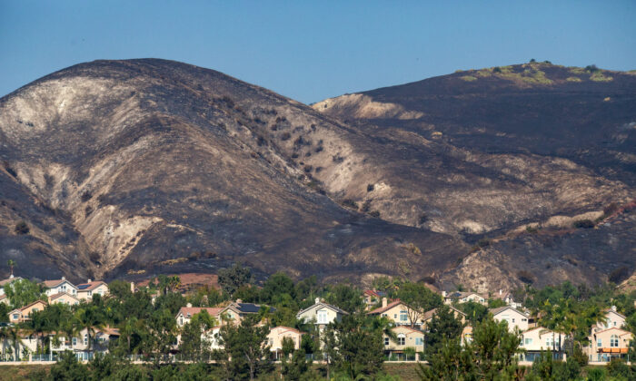 Traces of the Silverado Fire are seen in the scorched hills above Irvine, Calif., on Oct. 28, 2020. (John Fredricks/The Epoch Times)