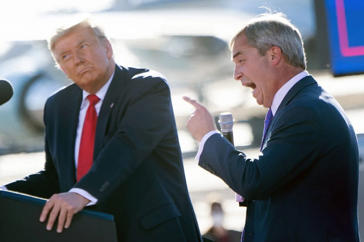 U.S. President Donald Trump listens as Nigel Farage (R) speaks during a Make America Great Again rally at Phoenix Goodyear Airport Oct. 28, 2020, in Goodyear, Arizona. (Brendan Smialowski/AFP via Getty Images)