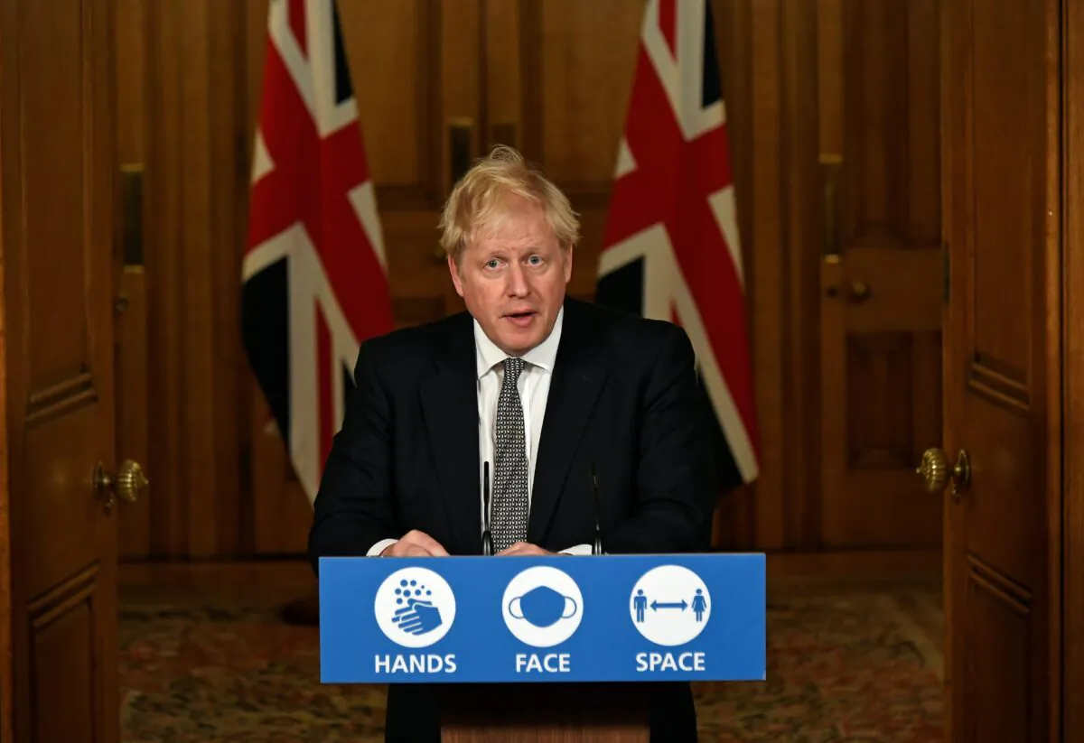 Britain's Prime Minister Boris Johnson speaks during a press conference announcing new restrictions to help combat the CCP virus outbreak, at 10 Downing Street in London, on Oct. 31, 2020. (Alberto Pezzali/Pool via Reuters)