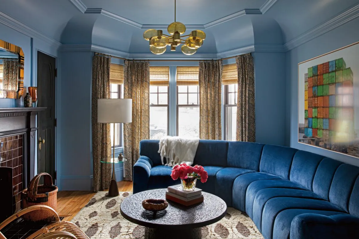 The family room is the most-used room in the house. With mid-blue walls and a sapphire velvet sectional, the room radiates warmth and coziness. (Paul Raeside)