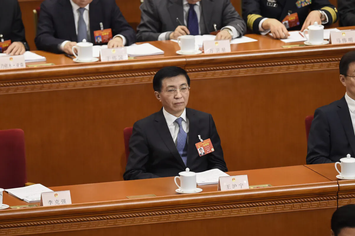 Wang Huning attends the opening session of CCP’s rubber stamp legislative conference at the Great Hall of the People in Beijing on Mar. 5, 2019. (Wang Zhao/AFP via Getty Images)