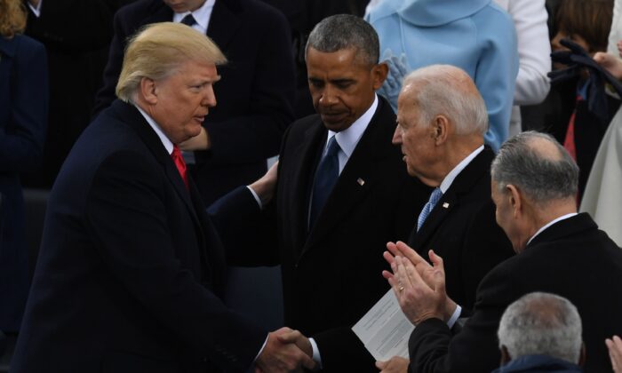 President Donald Trump (L) shakes hands with former President Barack Obama (C) and former Vice President Joe Biden after being sworn in as President at the Capitol in Washington on Jan. 20, 2017. (Mark Ralston/AFP via Getty Images)