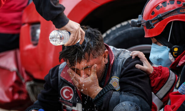 A member of rescue services takes a break