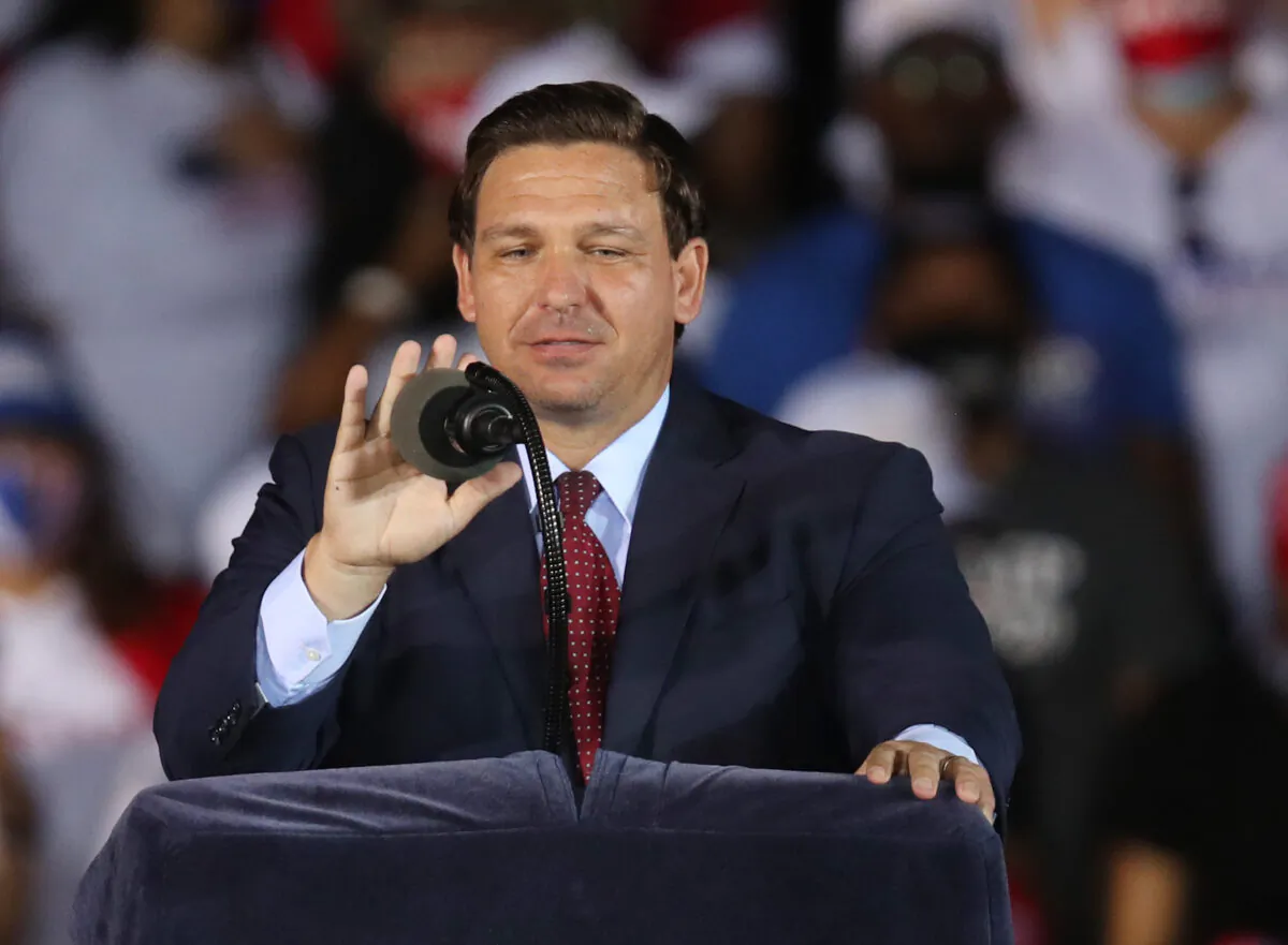 Florida Gov. Ron DeSantis speaks before the arrival of U.S. President Donald Trump for his campaign event at Miami-Opa Locka Executive Airport on Nov. 1, 2020 in Opa Locka, Florida. (Joe Raedle/Getty Images)