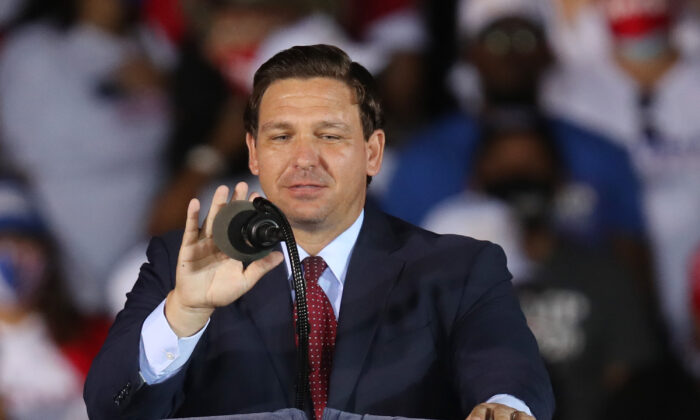 Florida Gov. Ron DeSantis speaks before the arrival of U.S. President Donald Trump for his campaign event at Miami-Opa Locka Executive Airport on Nov. 1, 2020 in Opa Locka, Florida. (Joe Raedle/Getty Images)