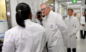 Australia Cancels UQ's CCP Virus Vaccine Trial After False HIV Results