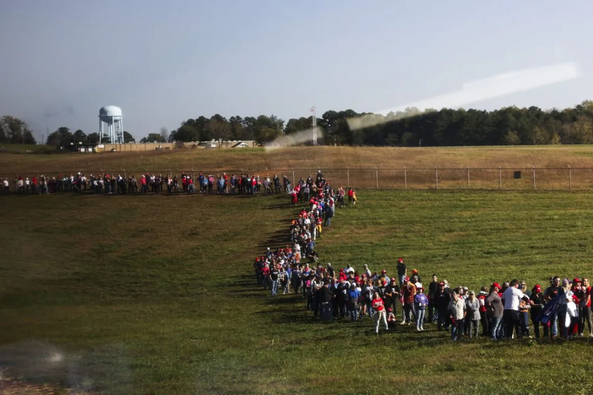 People wait in line to get into the Hickory Regional Airport to to see President Donald Trump speak at a rally in Hickory, N.C., on Nov. 1, 2020. (Michael Ciaglo/Getty Images)
