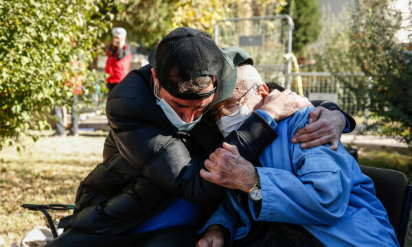 Local resients comfort each other