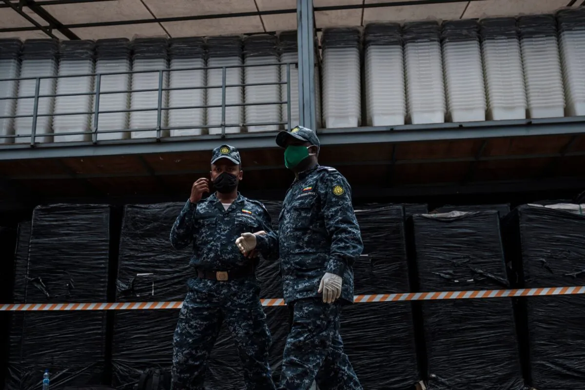 Police officers in a warehouse of the National Election Board of Ethiopia (NEBE), in Addis Ababa, Ethiopia, on Oct. 2, 2020. (Eduardo Soteras/AFP via Getty Images)