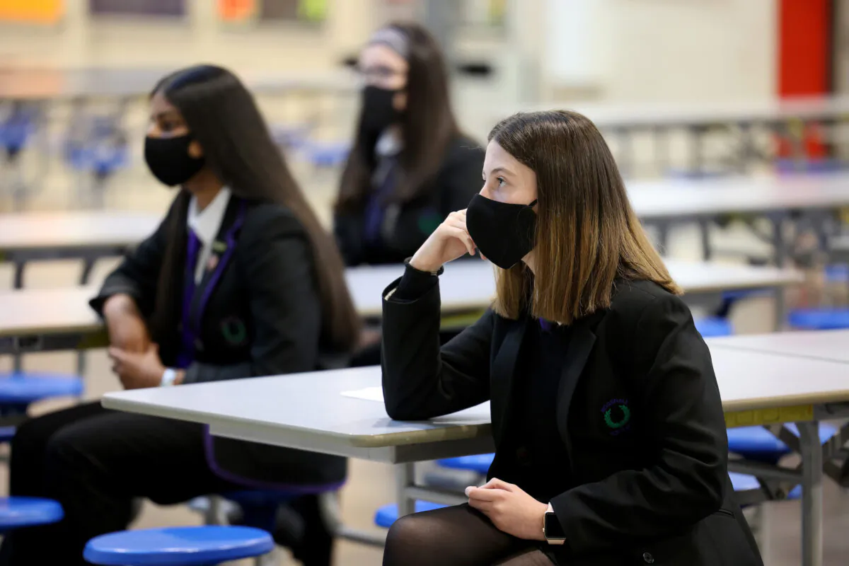 Pupils at Rosshall Academy wear face coverings in Glasgow, Scotland, on Aug. 31, 2020. Face coverings later became mandatory in high-risk schools in Scotland. (Jeff J Mitchell/Getty Images)