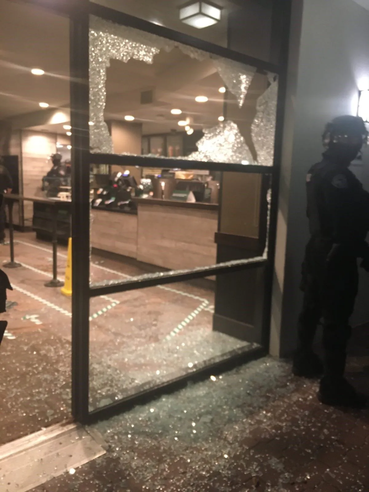Rioters smashed windows at a Starbucks in Portland, Ore., Nov. 2, 2020. (Unified Command)