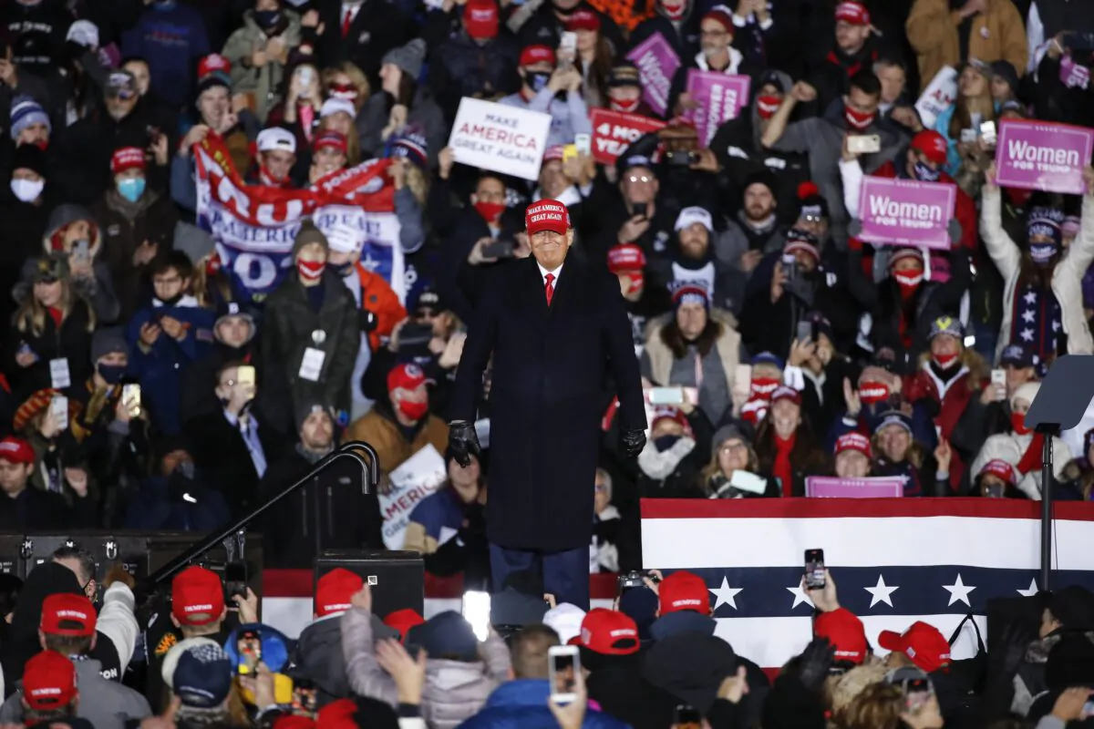 President Donald Trump smiles after speaking during a rally in Grand Rapids, Mich., on Nov. 3, 2020. (Kamil Krzaczynski/Getty Images)