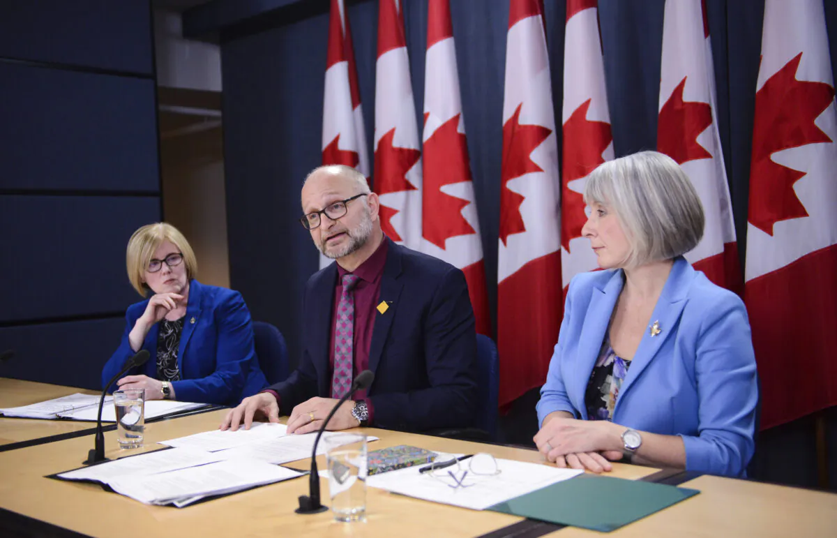 (L-R) Carla Qualtrough, Minister of Employment, Workforce Development and Disability Inclusion; David Lametti, Minister of Justice and Attorney General of Canada; and Patty Hajdu, Minister of Health, during a press conference at the National Press Theatre in Ottawa on Feb. 24, 2020 regarding the federal government's request to extend the deadline for revising its law on medical aid in dying. (The Canadian Press/Sean Kilpatrick)