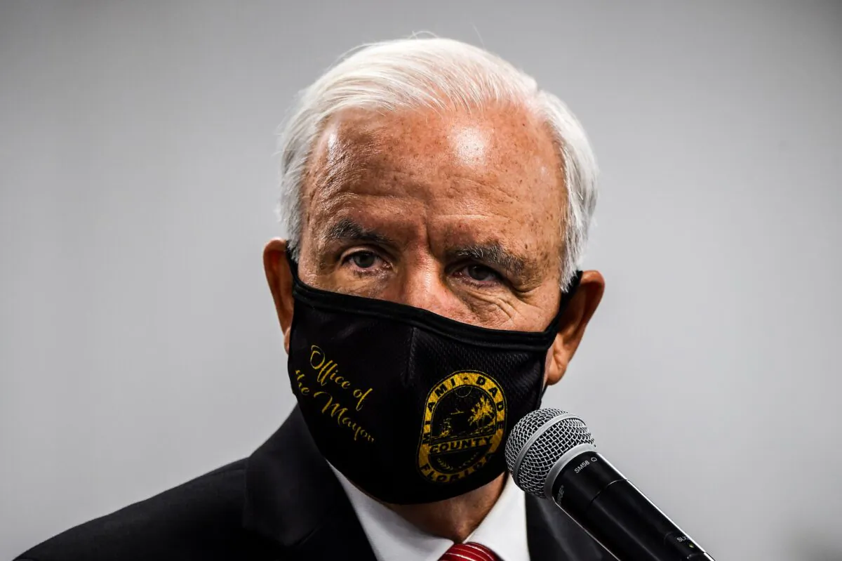 Miami-Dade County Mayor Carlos Gimenez wears a mask during a press conference to address the rise of CCP virus cases in the state, at Jackson Memorial Hospital in Miami on July 13, 2020. (Chandan Khanna/AFP via Getty Images)