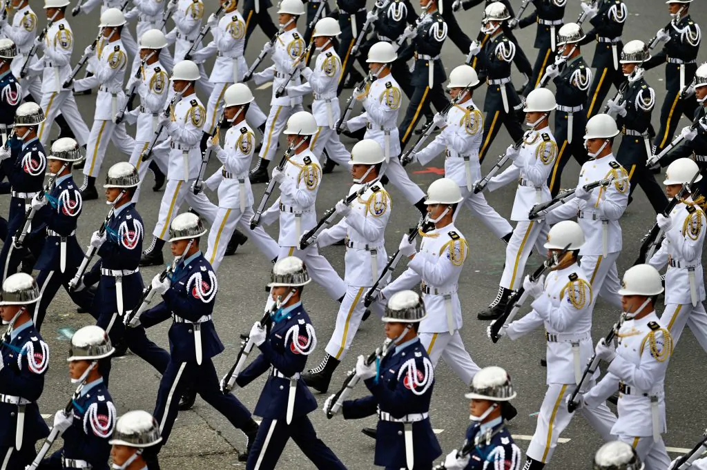 Taiwan's honor guards perform during the National Day celebration in front of the Presidential Office in Taipei on Oct. 10, 2020. (Sam Yeh/AFP via Getty Images)