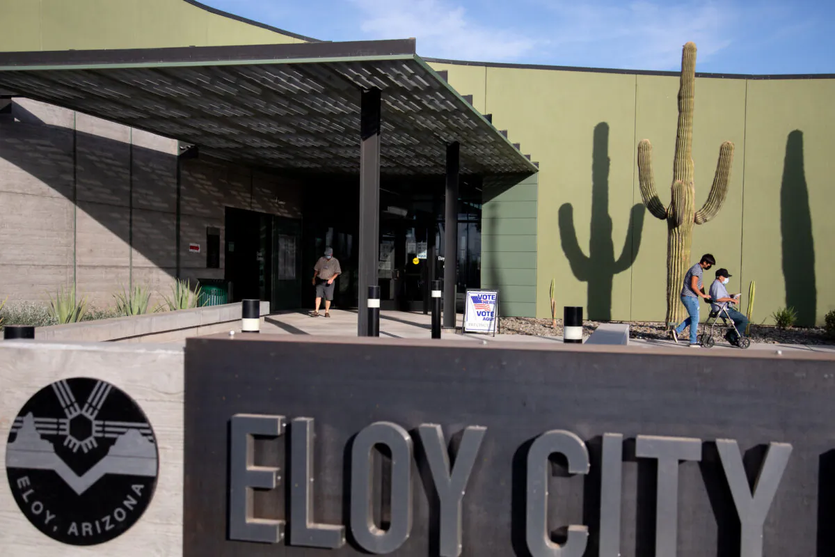 People exit the Eloy City Hall polling location on November 3, 2020 in Eloy, Arizona. (Courtney Pedroza/Getty Images)