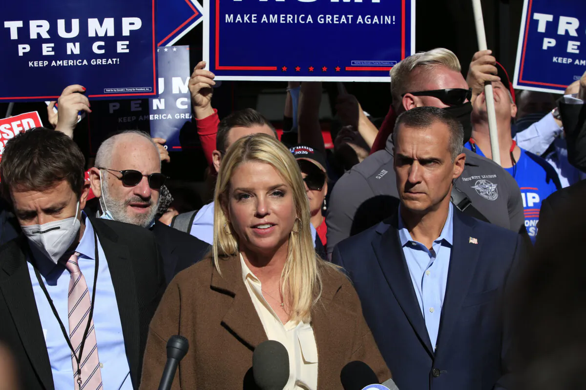 Former Florida Attorney General Pam Bondi, with Trump campaign adviser Corey Lewandowski (C R), speaks outside the Pennsylvania Convention Center in Philadelphia, Penn., on on Nov. 5, 2020. (Kena Betancur/AFP via Getty Images)