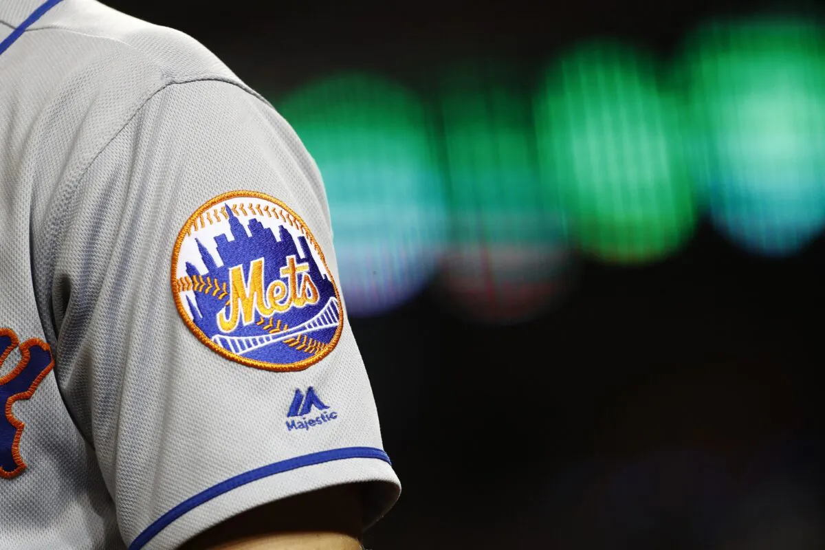 The New York Mets logo is seen on Brandon Nimmo's sleeve as he prepares for an at-bat during a baseball game against the Washington Nationals in Washington on Sept. 3, 2019. (Patrick Semansky/AP Photo, File) 