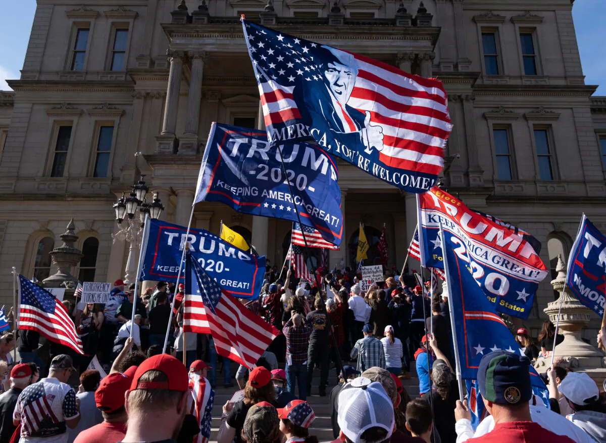 Supporters of U.S. President Donald Trump rally at the State Capitol in Lansing, Mich., on Nov. 7, 2020, (Seth Herald/AFP via Getty Images)