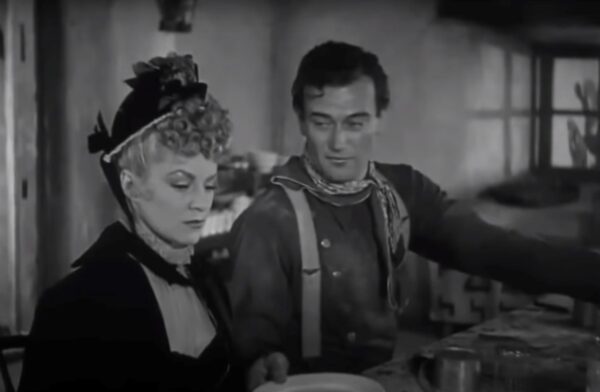 Claire Trevor and John Wayne in Stagecoach