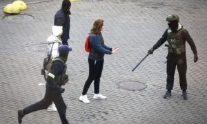Club-Wielding Police in Belarus Arrest Nearly 400 Protesters