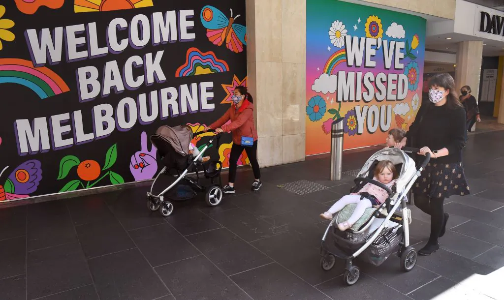 Measures to curb the spread of the Covid-19 coronavirus were eased allowing limited numbers of people back into shops, bars, cafes and restaurants in Melbourne on Oct. 28, 2020. (William West/AFP via Getty Images)