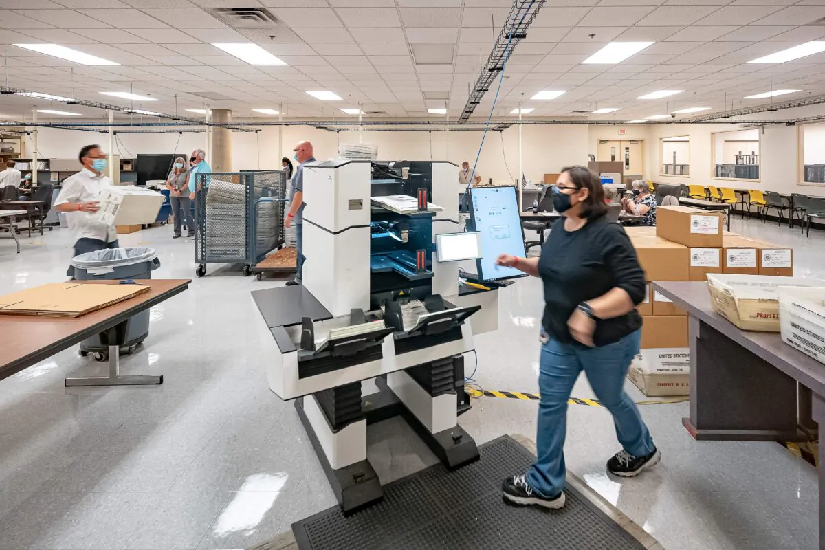 Ballots are counted at the Maricopa County Election Department in Phoenix, Ariz., on Nov. 5, 2020. (Olivier Touron/AFP via Getty Images)