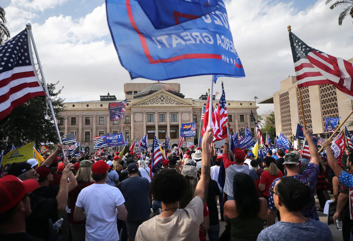 Supporters of former President Donald Trump demonstrate at a ‘Stop the Steal’ rally in front of the Arizona State Capitol in Phoenix late 2020. On Nov. 8, 2022, Republicans are projected to solidify narrow majorities in both state legislature chambers. (Mario Tama/Getty Images)