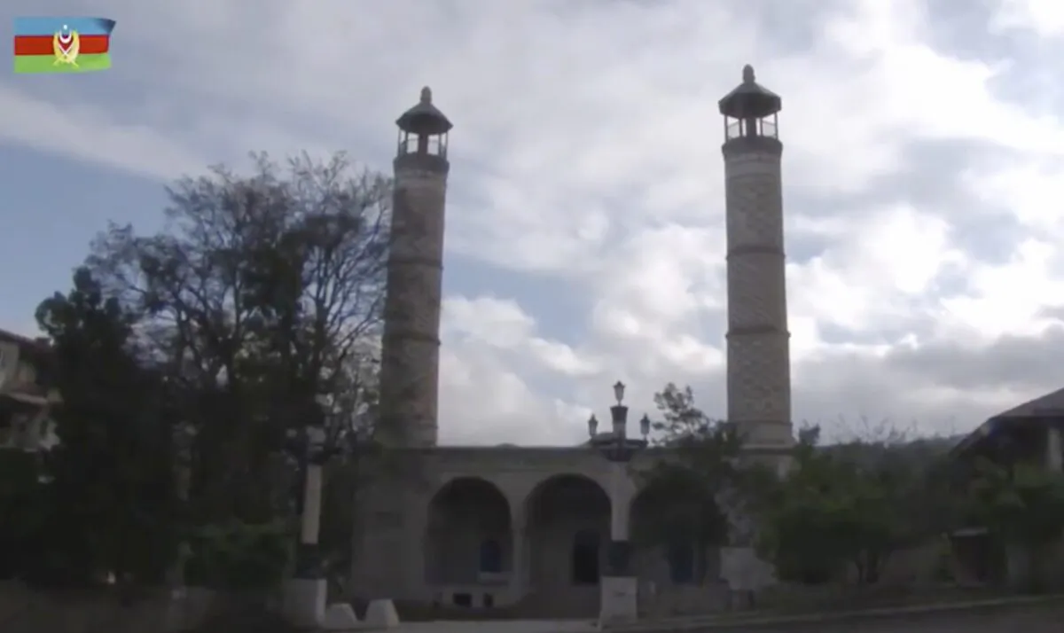 This photo taken from a video released by Azerbaijan's Defense Ministry, on Nov. 9, 2020, shows a view of Yukhari Govhar Agha Mosque in Shushi, in the separatist region of Nagorno-Karabakh. (Azerbaijan's Defense Ministry via AP)