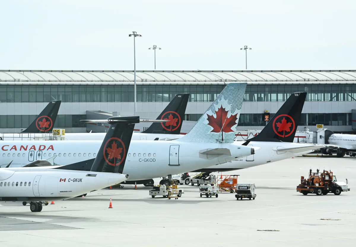 Air Canada planes sit on the tarmac at Pearson International airport during the COVID-19 pandemic in Toronto on Oct. 14, 2020. (The Canadian Press/Nathan Denette)