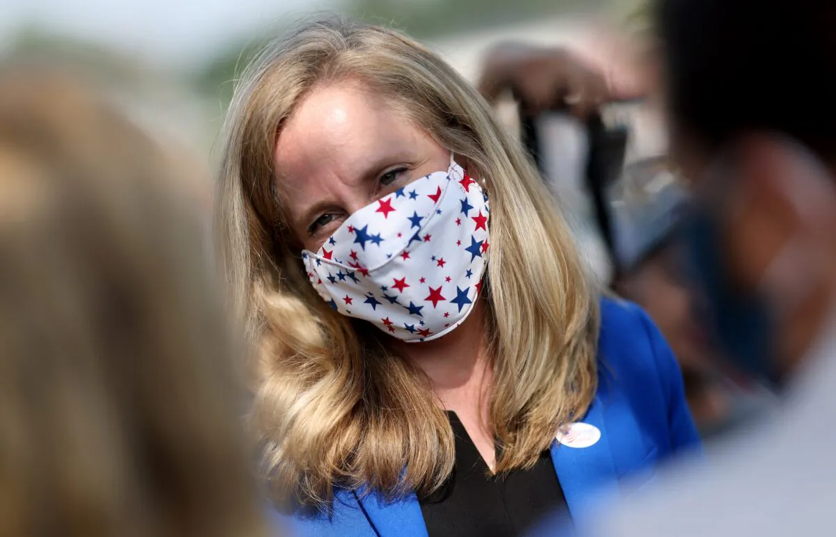 Rep. Abigail Spanberger (D-Va.) greets supporters outside the Orange County Registrar's office in Orange, Va., on Sept. 18, 2020. (Win McNamee/Getty Images)