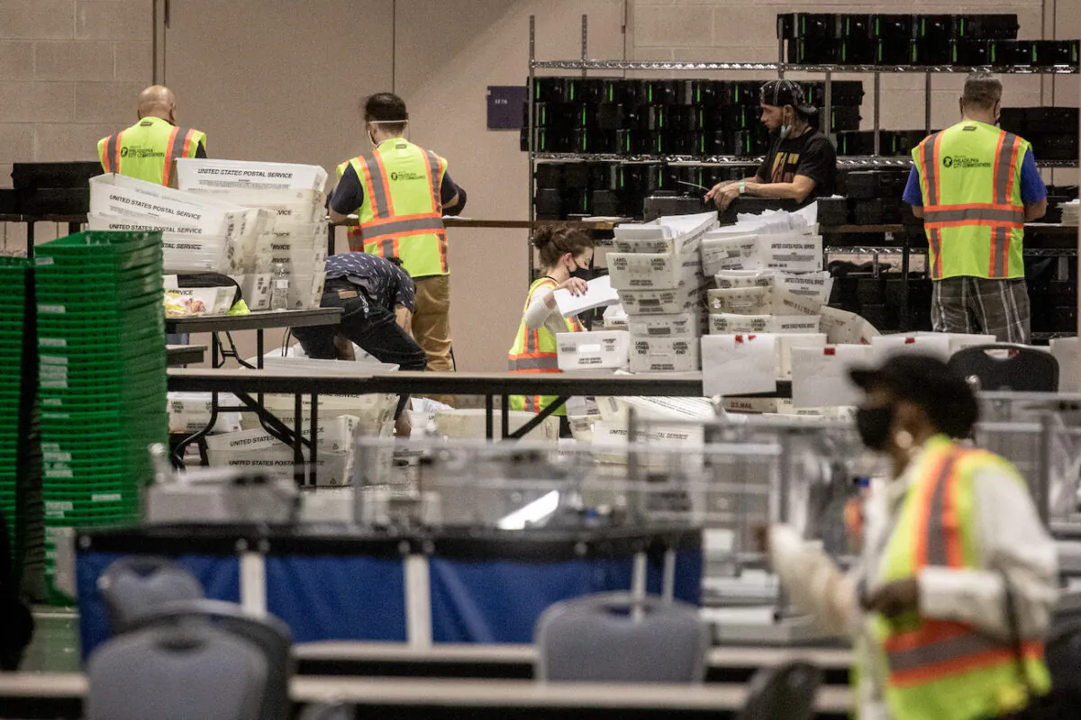Election workers count ballots at the Philadelphia Convention Center in Philadelphia, Pa., on Nov. 6, 2020. (Chris McGrath/Getty Images)