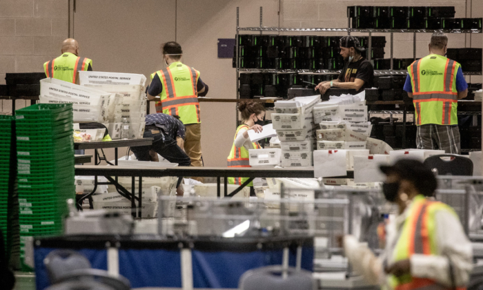 Election workers count ballots at the Philadelphia Convention Center in Philadelphia, Pa., on Nov. 6, 2020. (Chris McGrath/Getty Images)