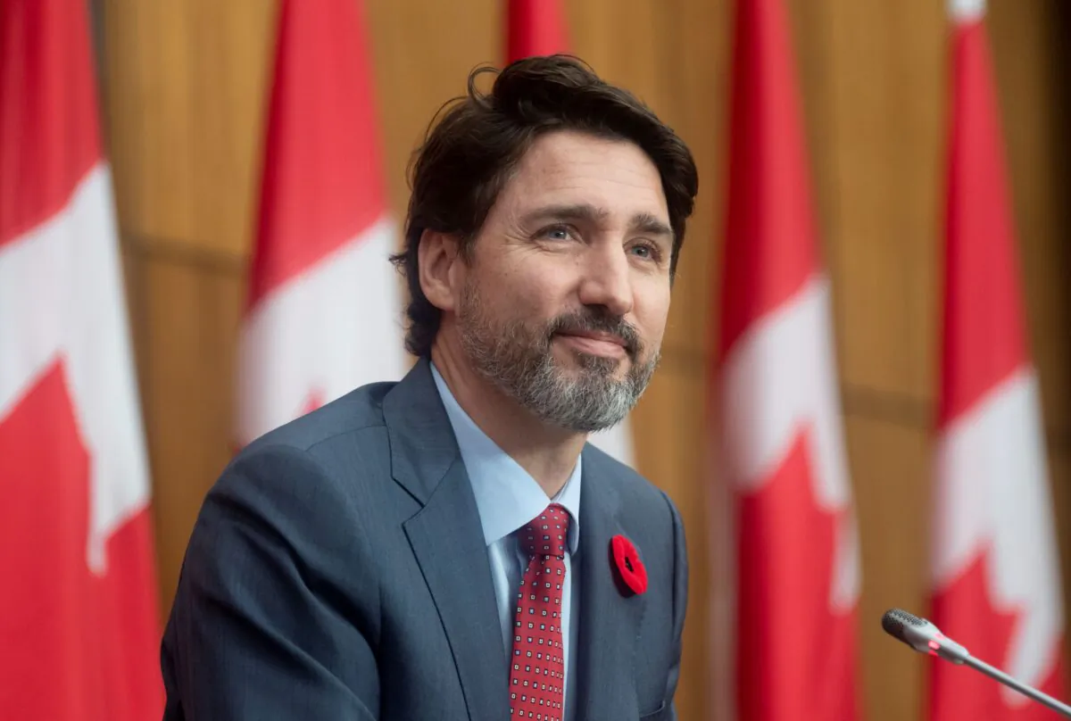 Prime Minister Justin Trudeau listens to a reporter's question during a news conference in Ottawa on Nov. 10, 2020. (The Canadian Press/Adrian Wyld)