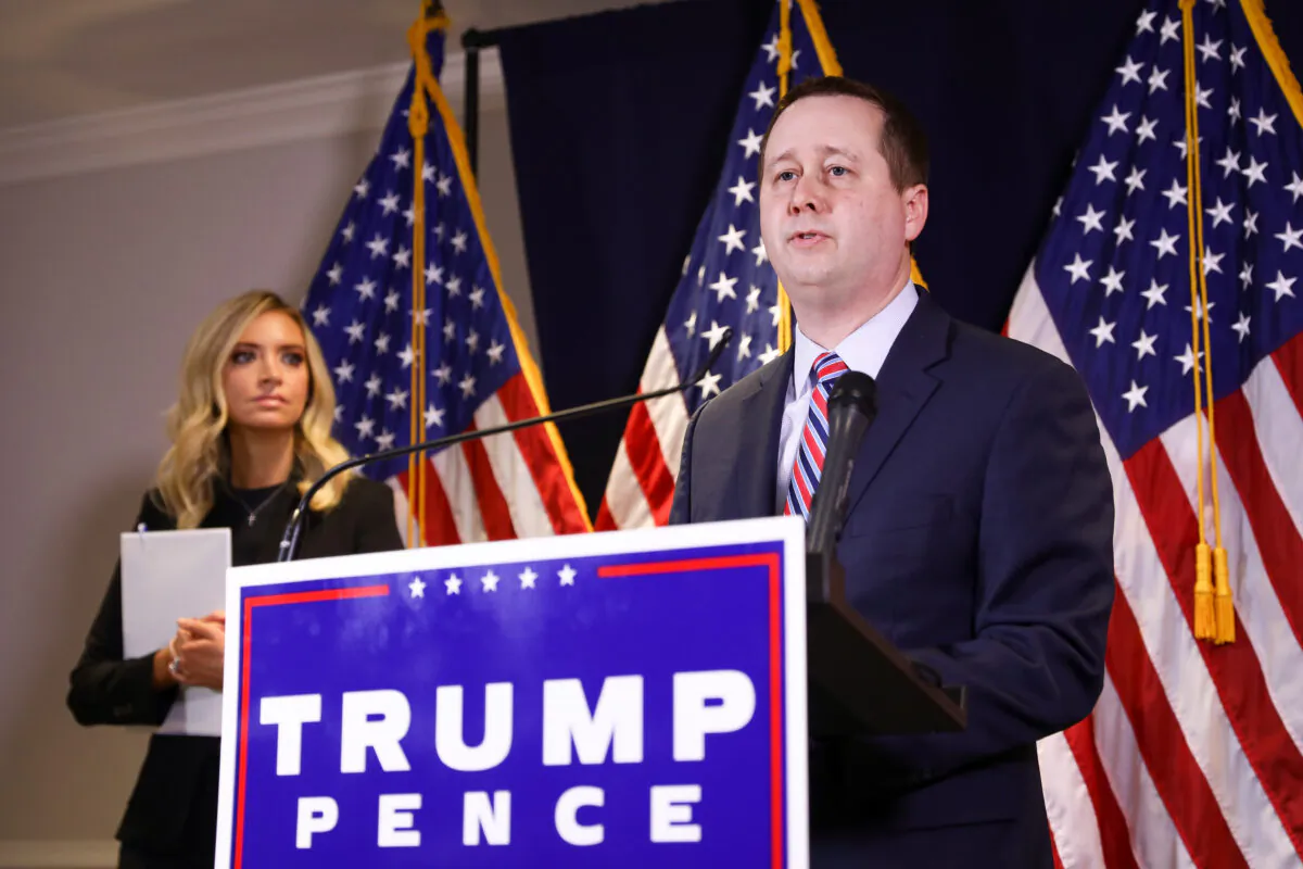 Trump campaign legal counsel Matt Morgan (R) speaks to media while White House Press Secretary Kayleigh McEnany looks on, at the RNC headquarters in Washington on Nov. 9, 2020. (Charlotte Cuthbertson/The Epoch Times)
