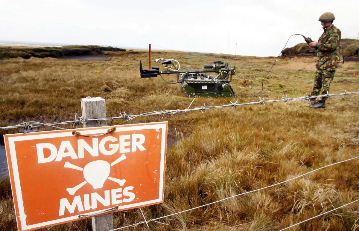 A Joint Service Explosive Ordnance Disposal robot “Red Fire” is prepared to recover a mine in Stanley, Falkland Islands, on Feb. 9, 2007. (Peter Macdiarmid/Getty Images)