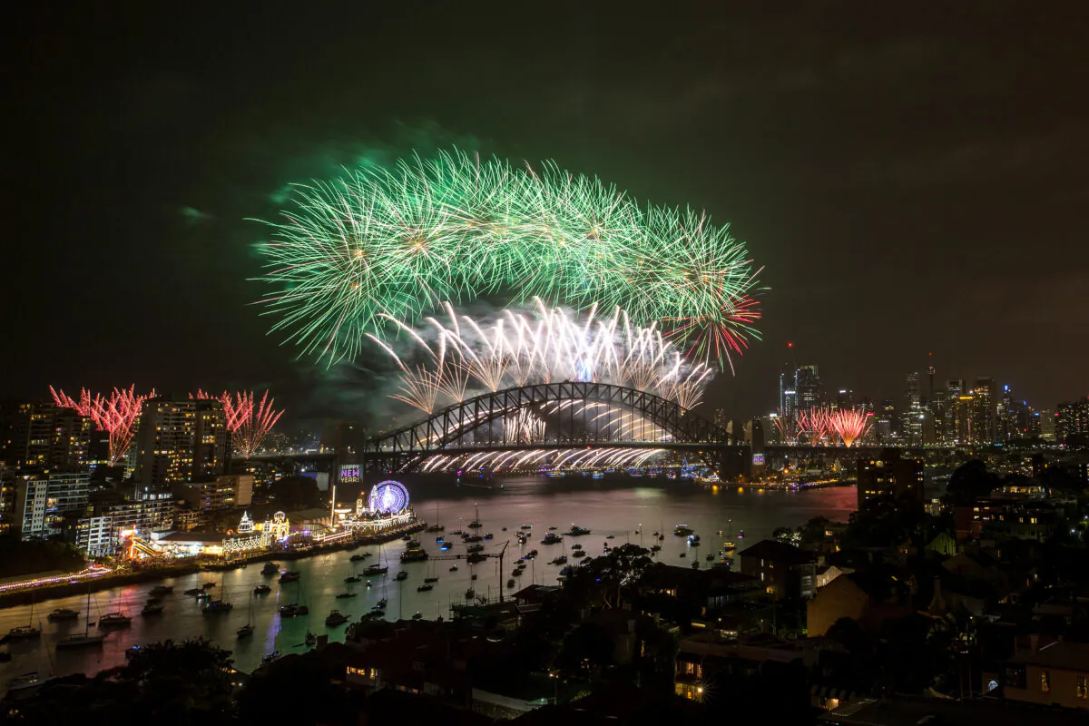 Fireworks light up the sky above Sydney Harbour during the midnight fireworks display during New Year's Eve celebrations on January 1st, 2020 (Cameron Spencer/Getty Images)