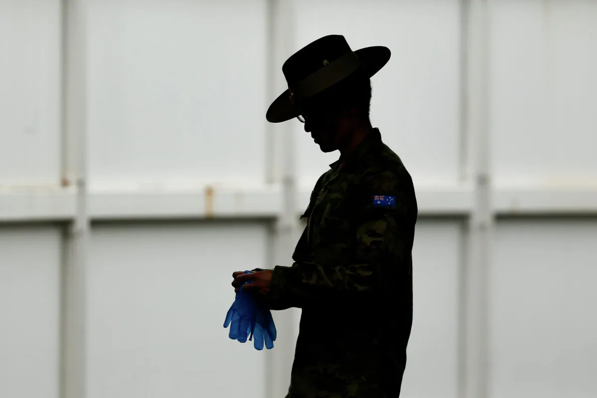 A member of the Defence Force at Sydney Airport, Australia on March 30, 2020. (Brendon Thorne/Getty Images)
