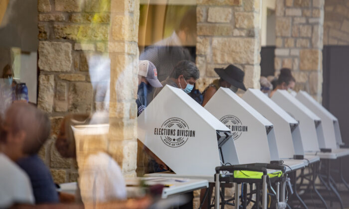 People cast their ballots at a polling location in Austin, Texas, on Oct. 13, 2020. (Sergio Flores/Getty Images)