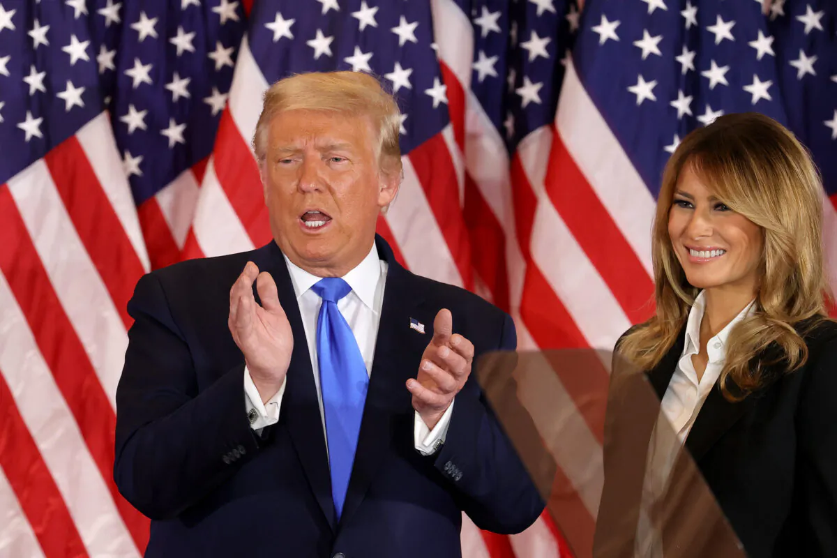 President Donald Trump and First Lady Melania Trump take the stage on election night in the East Room of the White House in Washington early Nov. 4, 2020. (Chip Somodevilla/Getty Images)