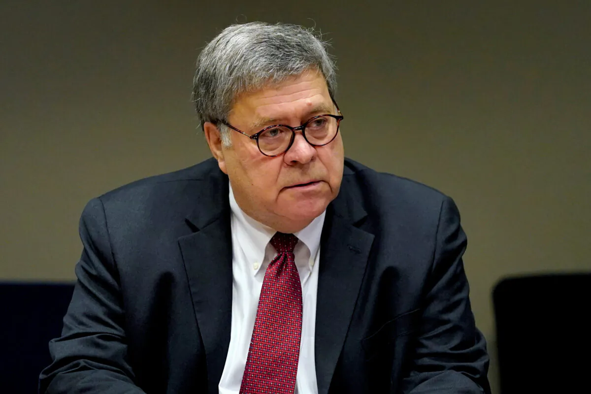 Attorney General William Barr meets with members of the St. Louis Police Department, in St. Louis, Mo., on Oct. 15, 2020. (Jeff Roberson/Pool via Reuters)