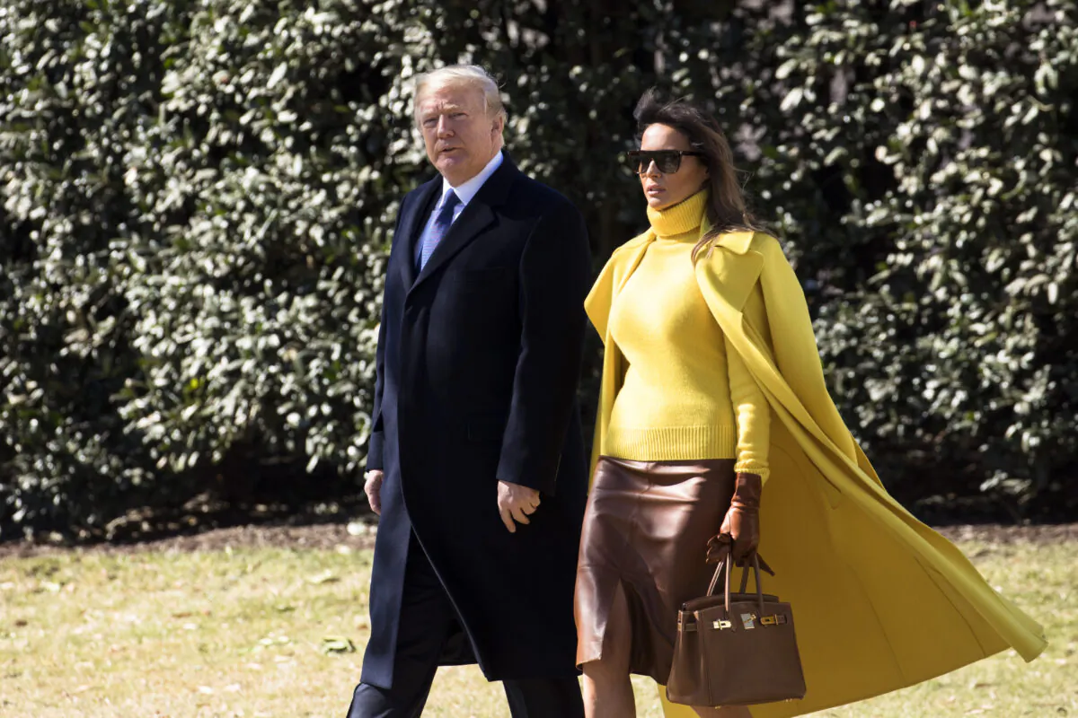 President Donald Trump and First Lady Melania Trump about to board Marine One on the South Lawn of the White House on Jan. 1, 2018, en route to Joint Base Andrews to depart to Cincinnati, Ohio. (Samira Bouaou/The Epoch Times)