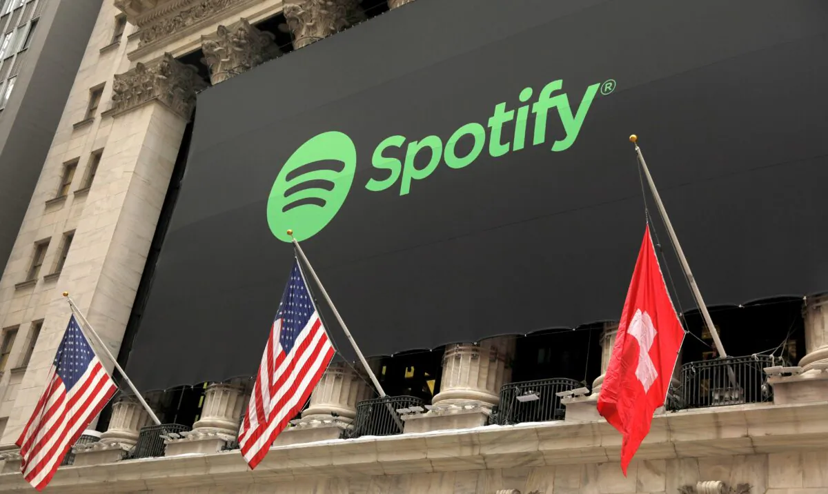 The Spotify logo hangs on the facade of the New York Stock Exchange in New York, on April 3, 2018. (Lucas Jackson/Reuters)