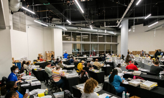 Employees of the Fulton County Board of Registration and Elections process ballots in Atlanta, Ga., on Nov. 4, 2020. (Brandon Bell/Reuters)
