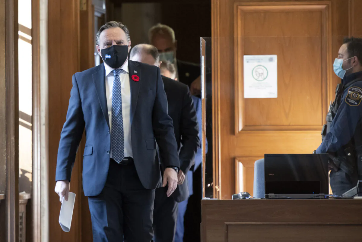 Quebec Premier Francois Legault walks to a news conference on the COVID-19 pandemic at the legislature in Quebec City on Nov. 5, 2020. (Jacques Boissinot/The Canadian Press)