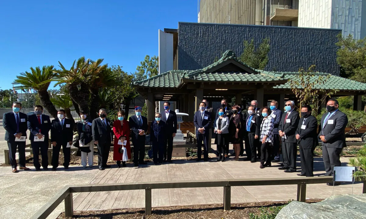Officials gather to celebrate the 50th anniversary of the Orange County Japanese Garden and Tea House in Santa Ana, Calif., on Nov. 10, 2020. (Drew Van Voorhis/The Epoch Times) 